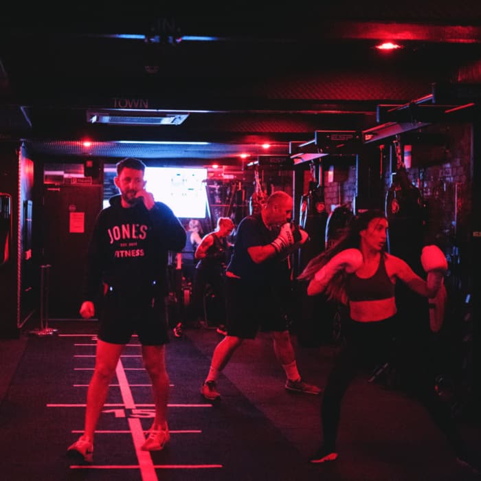 Group fitness class exercising together